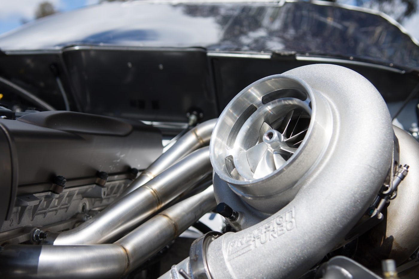Custom turbo and stainless piping in an engine bay